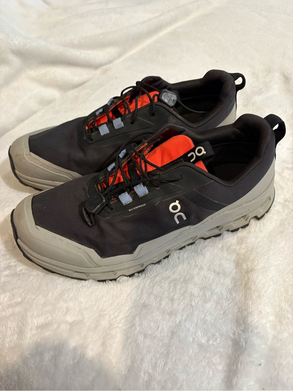 On Running Men's Trail Sneakers in Black, Gray and Red Accent